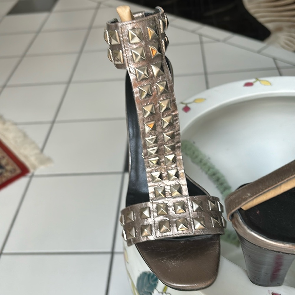 Fashion forward, stylish with metal squares embedded on straps